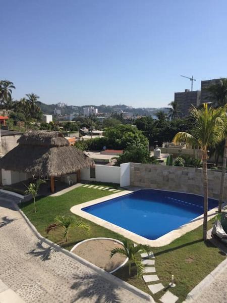 A la foto es mostra l'objecte Hermoso y acogedor departamento Colinas Santiago situat a la ciutat de Manzanillo.