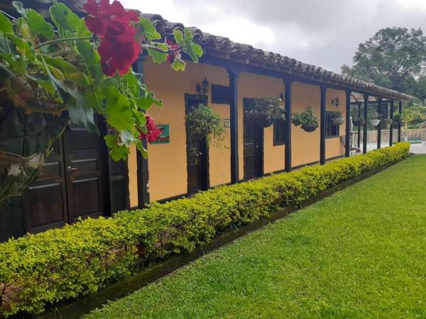 На фото показан объект Finca cafetera para tu descanso-Finlandia Quindio, расположенный в городе Маравелес.