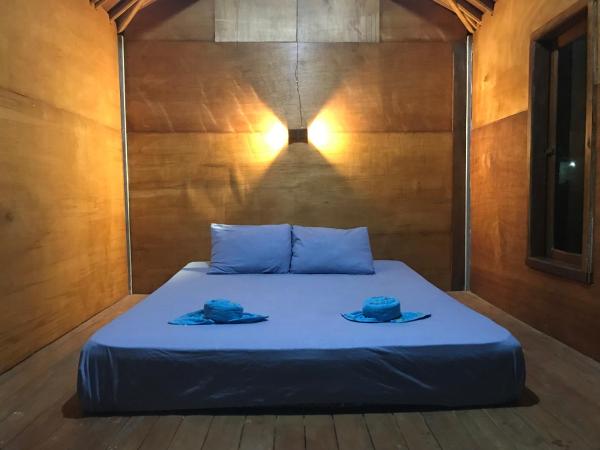 A la foto es mostra l'objecte Muni's Lombok Bungalow situat a la ciutat de Sakra.