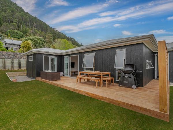 Op de foto is het object A Sunshine Retreat - Pauanui Holiday Home te zien, gelegen in de stad Pauanui.
