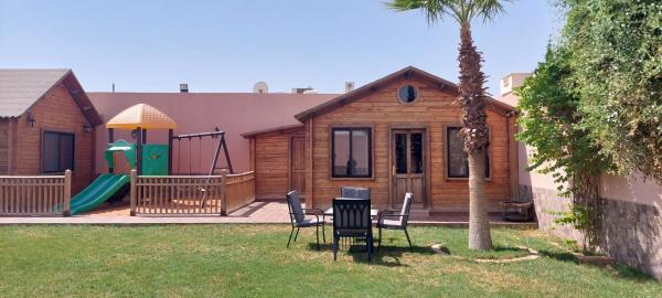 A la foto es mostra l'objecte Tola Holiday House Al Rimal situat a la ciutat de Riad.