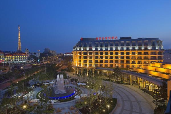 Na fotografii je vidět objekt Sheraton Qinhuangdao Beidaihe Hotel nacházející se ve městě Dapuhe.