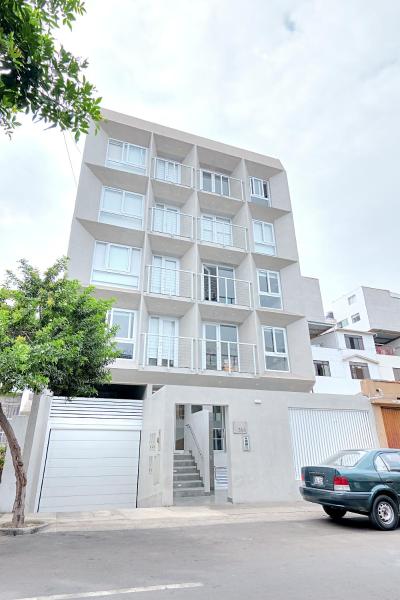 A la foto es mostra l'objecte Quark Apartments situat a la ciutat de Lima.