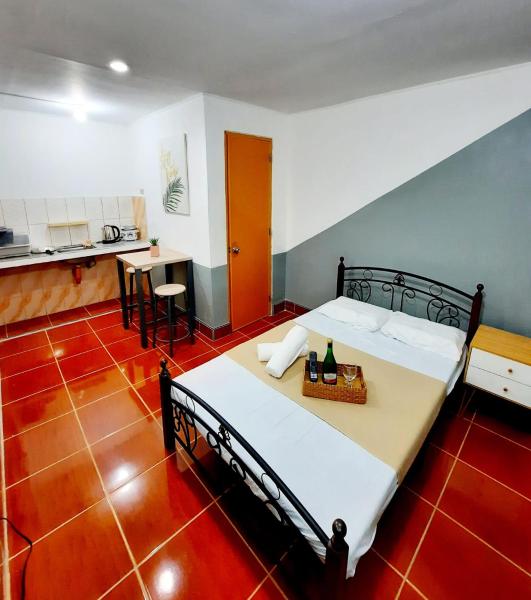 Foto 1: Studio type unit - Host Homes Apitong
