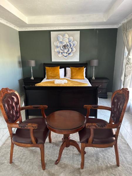 A la foto es mostra l'objecte Kimberley Boutique Guest Lodge situat a la ciutat de Kimberley.