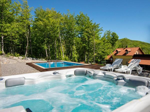 Na fotografii je vidět objekt Chalet Didova suma 2 by Interhome nacházející se ve městě Alan.