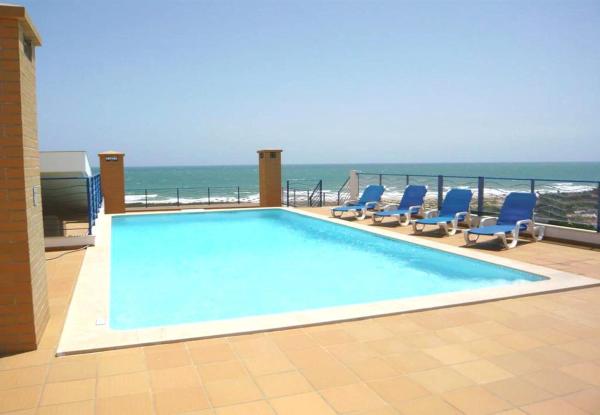 A la foto es mostra l'objecte LGS65T2, Luxuoso T2 frente praia, em condominio situat a la ciutat de Lagos.