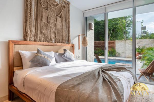 Na zdjęciu widoczny jest obiekt NHOA 101B Lux 1BR Condo Pool access in Aldea Zama położony w mieście Tulum.