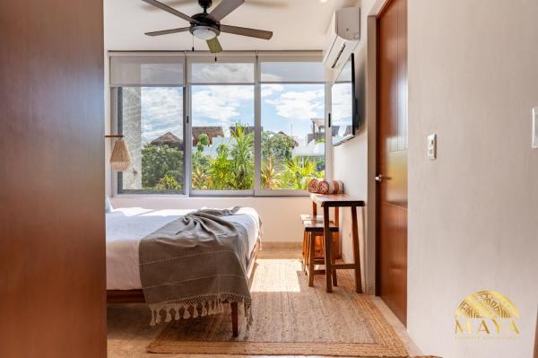 Na zdjęciu widoczny jest obiekt NHOA 305A Lux 2BR Condo Pool View in Aldea Zama położony w mieście Tulum.