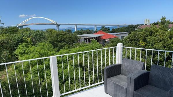 The photo shows the Sea Sunset Villa located in the city of Ufugumui.