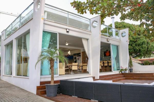 På billedet ses objektet Charme, pôr do sol, praia privada. Exclusividade. beliggende i byen Florianópolis.