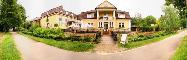 A la foto es mostra l'objecte Willa Kolor Pokoje Apartamenty Restauracja situat a la ciutat de Ustroń.
