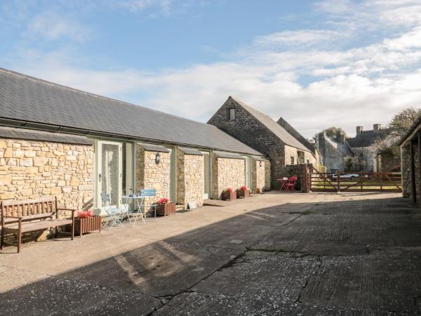 A la foto es mostra l'objecte Poppy Cottage situat a la ciutat de Wick.