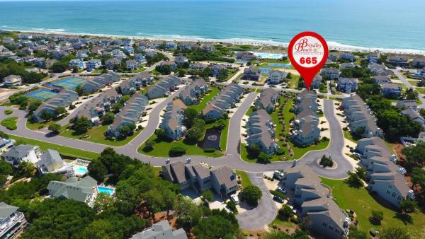 A la foto es mostra l'objecte Oceanside, Hot Tub, Community Amenities, Close to beach, 665, Shore Beats Work situat a la ciutat de Corolla.