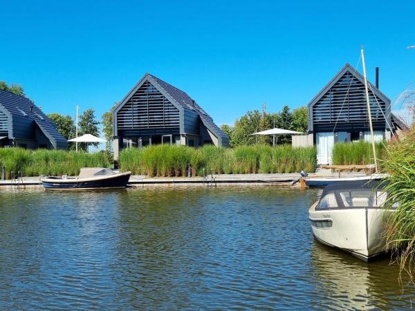 The photo shows the Villa in Balk with Private Jetty on Slotermeer located in the city of Balk.