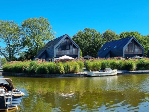The photo shows the Villa in Balk with Private Jetty on Slotermeer located in the city of Balk.