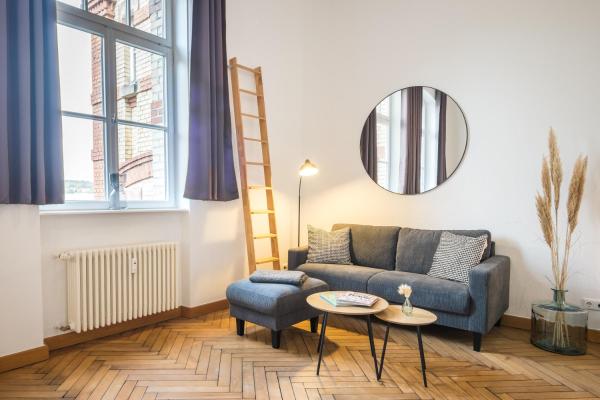 A la foto es mostra l'objecte SCHWARZLINS LoftRaum - Stilvolles Apartment mit Smart TV, NETFLIX, Disney Plus, schnellem WLAN, Parken, Nespresso situat a la ciutat de Sankt Ingbert.