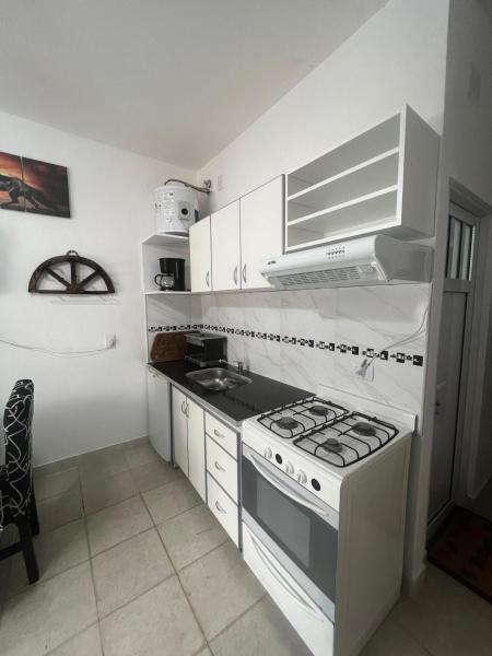 A la foto es mostra l'objecte Cozy and Relaxing apartment in Canning and Ezeiza situat a la ciutat de Ezeiza.
