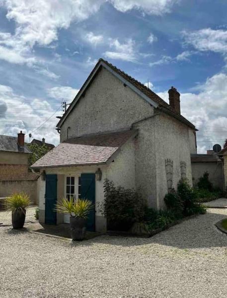 Na fotografii je vidět objekt Maison d'hôtes Au Petit Lavoir nacházející se ve městě Bleury.