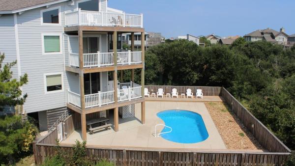 A la foto es mostra l'objecte Oceanside, Private Pool, Screened Porch, Close to Beach Access, OS3H, Brigadune situat a la ciutat de Corolla.