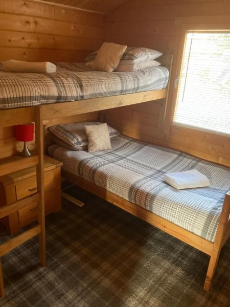 Foto 6: Log Cabin in the City with hot tub