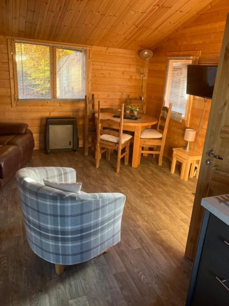 Foto 5: Log Cabin in the City with hot tub