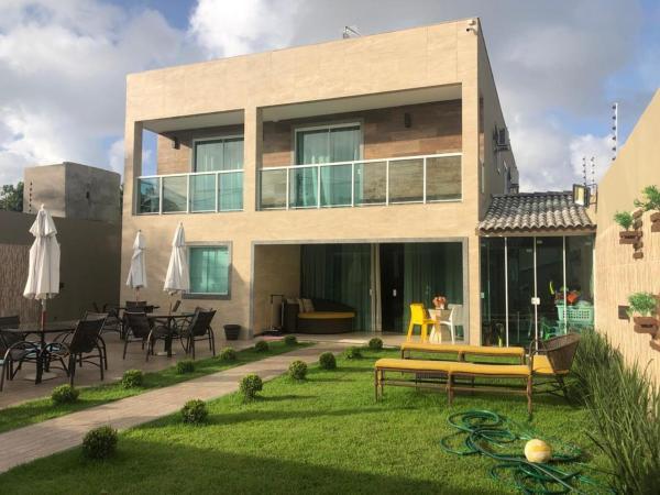 På billedet ses objektet LINDA CASA BARRA DE JACUIPE 8/4 ACOMODA ATE 20 PESSOAS beliggende i byen Camaçari.
