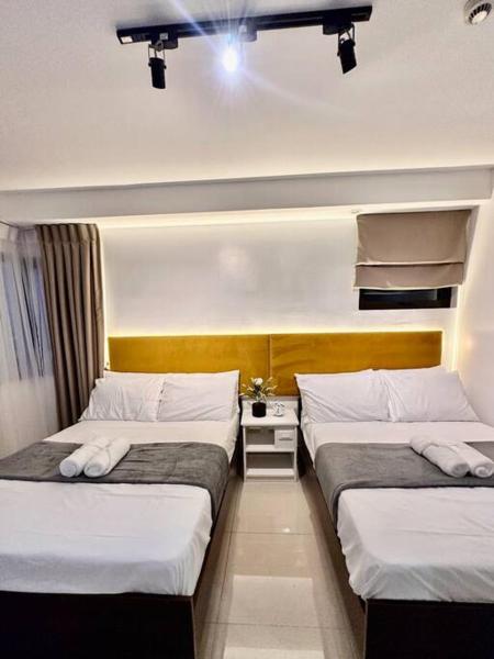 Hotel living,The Persimmon double beds 4pax (1404), Cebú