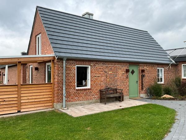 Na zdjęciu widoczny jest obiekt Ferienwohnung „Backhuus“ - Hof Mühlenkoppel położony w mieście Hasselberg.