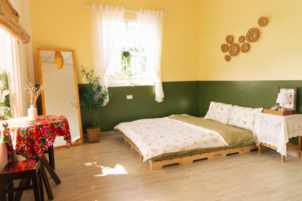 A la foto es mostra l'objecte Phòng Sầu Riêng(Durian Room) - Nhà Mơ Homestay situat a la ciutat de Ben Tre.