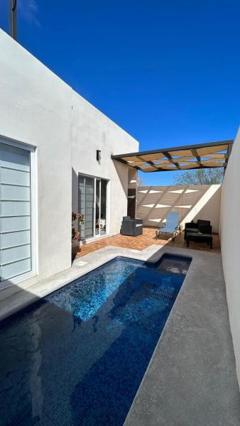 En la foto se muestra el objeto Casa Relax w/Pool & Rooftop Lounge ubicado en la ciudad de El Quelele.