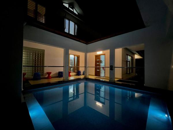 A la foto es mostra l'objecte Casita Greenacres Homestay situat a la ciutat de Vythiri.