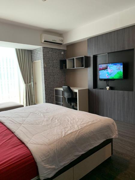 A la foto es mostra l'objecte Vins Room at Mataram City Tower Sadewa situat a la ciutat de Kejayan.