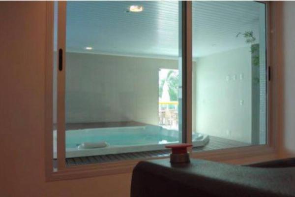 A la foto es mostra l'objecte 2 mai 1 Quartos, varanda vista mar,cond Jacuzzi, piscina, Sauna e mais - Charitas situat a la ciutat de Niterói.