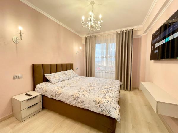 A la foto es mostra l'objecte Апартаменты в парке Долина Роз situat a la ciutat de Chisinau.
