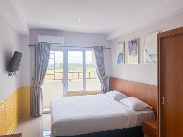A la foto es mostra l'objecte Skyview Setiabudi Apartment Medan Mitra RedDoorz situat a la ciutat de Sunggal.