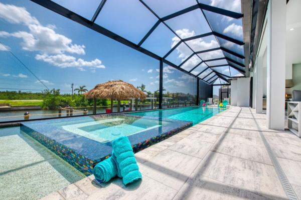Na fotografii je vidět objekt VILLA FOURTASTIC VIEW - 4 BEDS - 4,5 BATHS - 8 GUESTS - GULF ACCESS & POOL/SPA - BOAT nacházející se ve městě Flamingo Bay.