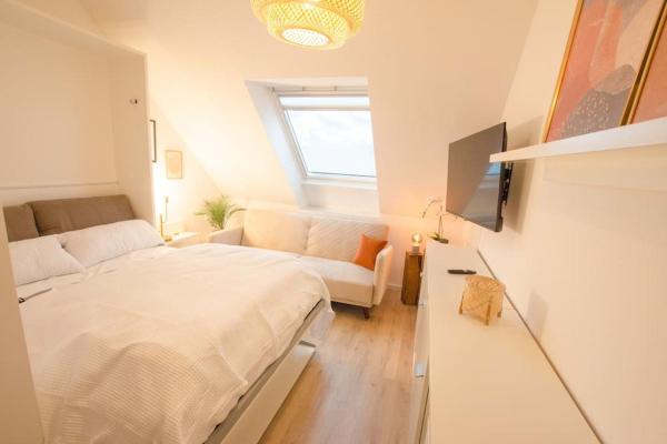 På billedet ses objektet CASARINA - Gemütliches Apartment im Zentrum beliggende i byen Augsburg.