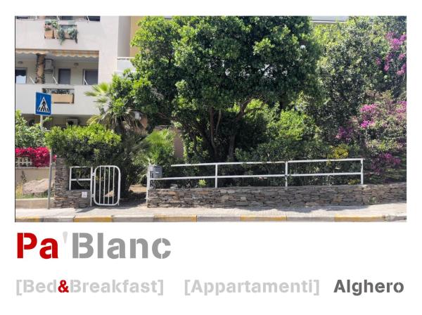 写真にはアルゲーロ市にあるPà Blanc Apartmentsが写っています。