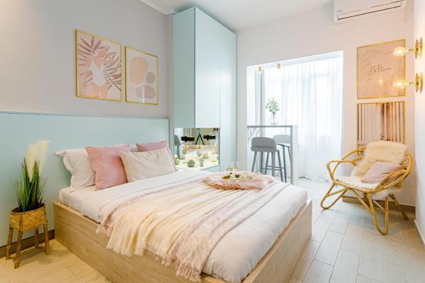 Na zdjęciu widoczny jest obiekt Downtown Studios - Your Modern Escape near Ateneul Roman położony w mieście Bukareszt.