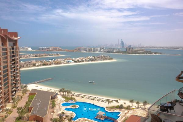 A la foto es mostra l'objecte Manzil - 3BR in Palm Jumeirah with Private Beach Access & Sea View situat a la ciutat de Dubai.