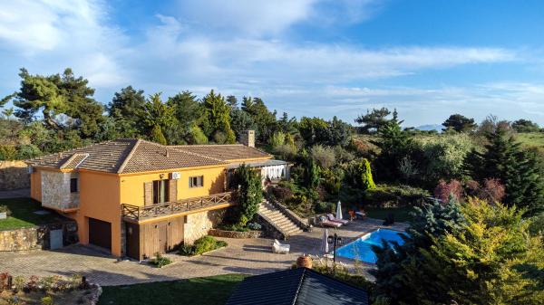 A la foto es mostra l'objecte Maison Christine Villa situat a la ciutat de Grammatiko.