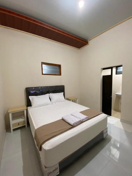 На фото показан объект Nawasena Guesthouse Jogja, расположенный в городе Kalasan.