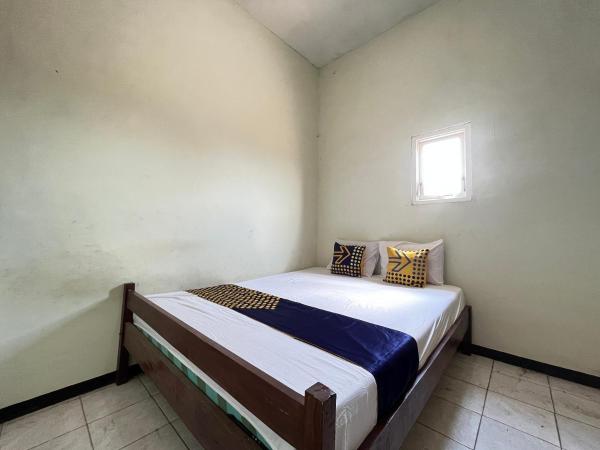 照片显示了位于Lawang市的Hotel O Kost Berkah Near Kebun Teh Wonosari物件。