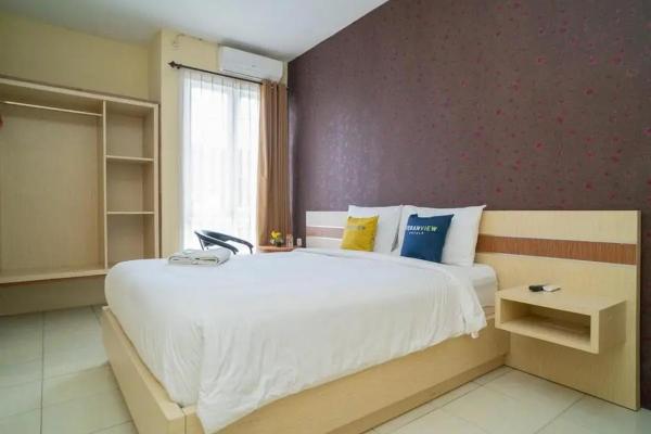 Na zdjęciu widoczny jest obiekt Urbanview Hotel Omah Anin Batu by RedDoorz położony w mieście Tlekung.