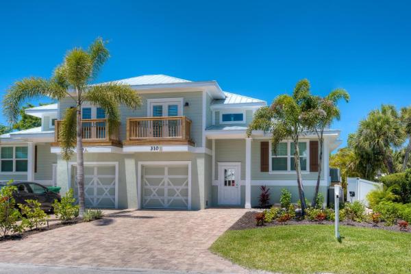 En la foto se muestra el objeto Key Lime Cottage ubicado en la ciudad de Holmes Beach.