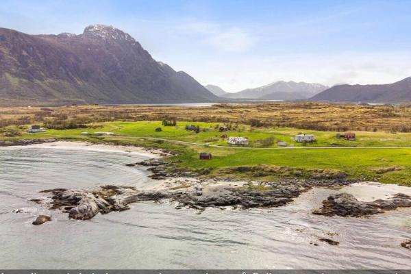 A la foto es mostra l'objecte Strandhus med panoramautsikt situat a la ciutat de Sand.