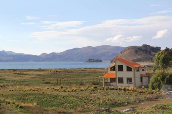 На фото показан объект Lago Sagrado Titicaca - Casa de Campo & Agroturismo, расположенный в городе Уатахата.