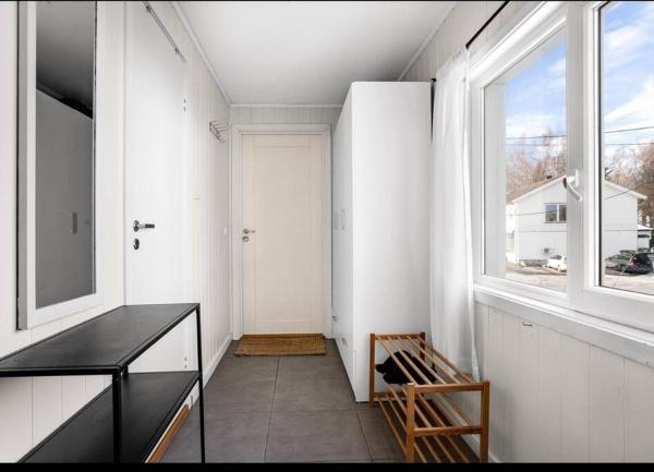 The photo shows the Modern 2-bedroom apartment located in the city of Gystad.