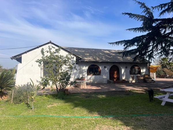 A la foto es mostra l'objecte Casa de Campo en Malloco situat a la ciutat de Peñaflor.